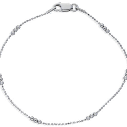 Bransoletka srebrna złożona z błyszczących kulek