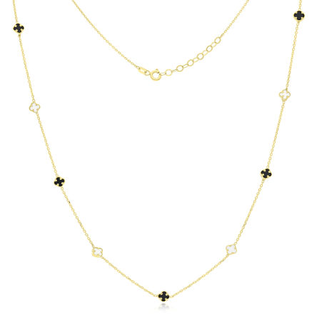 Złoty naszyjnik z czarnymi i białymi kamieniami